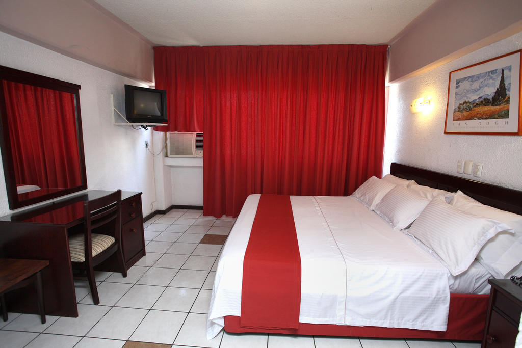 Hotel Robert Prince Poza Rica Rom bilde